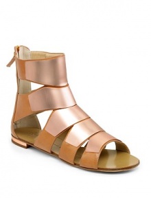 THE LOOKMetal panelsBack zip closureOpen toe and side ventsMetal detail on heelTHE FITHeel ½ (15mm)THE MATERIALLeatherMetal Leather lining and soleORIGINMade in Italy