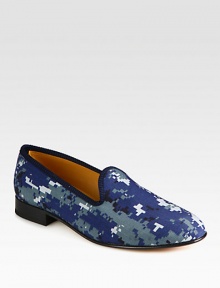 Not your typical military-style camo, this bold, digitized update, with grosgrain trim, is perfect for the contemporary man-of-style.Cotton upperPadded insoleLeather soleMade in Italy
