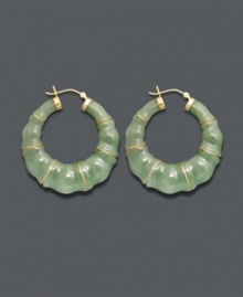 Good luck and great style combine in these unique hoop earrings. Crafted from solid jade (68 mm), earrings feature a bamboo-style pattern with 14k gold accents and backing. Approximate diameter: 1-1/2 inches.