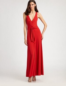 Fluid jersey, tailored with a prettily pleated bodice and alluring open back.V necklineSleevelessPleated bodiceBanded waist with front tieFront slitTwisted back strapsConcealed back zipAbout 44¾ from natural waistPolyesterDry cleanImportedModel shown is 5'10 (177cm) wearing US size Small. 