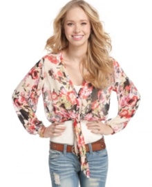 Get all tied up in florals with this floaty top from American Rag! Layers great with jeans and a tank for an extra pretty day look. Get all tied up in florals with this floaty top from American Rag! Layers great with jeans and a tank for an extra pretty day look.