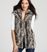 A wide shawl collar lends sumptuous warmth to this Alicia + Olivia faux fur vest, lush and relaxed for every day decadence.