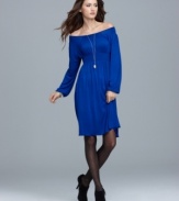 As pretty as can be, Cha Cha Vente's smocked frock shows off just the right amount of shoulder!