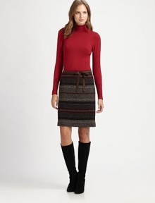 A stretch-wool skirt offering irresistible texture and classic darts for an impeccable fit.Self-tie beltWaist dartsAbout 22 longVirgin wool/nylonDry cleanImported Model shown is 5'11 (180cm) wearing US size 4. 