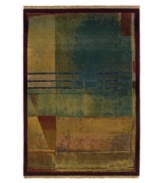 Radiating an abstract beauty, this rug features overlapping planes with a triple stripe accent cutting across the composition. Soft greens, blues, golds and reds blend into each other with a soft luminosity, framed with a rich crimson border.