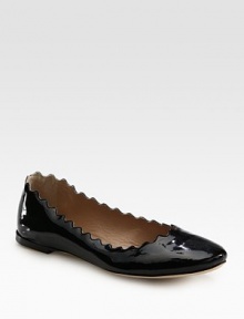 Shiny patent leather flat with a scalloped upper and comfy padded insole. Patent leather upperLeather lining and solePadded insoleMade in ItalyOUR FIT MODEL RECOMMENDS ordering true size. 