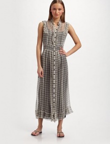 Airy silk chiffon in graphic window checks, is trimmed with ruffles for an ultra femme design.Ruffled collar Sleeveless with ruffle trim Ruffled front button placket Seamed waist Ruffled hem Contrast rayon camisole dress About 50 from shoulder to hem Silk; dry clean Made in Italy Airy silk chiffon in graphic window checks, is trimmed with ruffles for an ultra femme design.Ruffled collar Sleeveless with ruffle trim Ruffled front button placket Seamed waist Ruffled hem Contrast rayon camisole dress About 50 from shoulder to hem Silk; dry clean Made in Italy