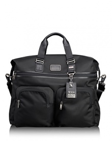 Rendered in ballistic nylon with leather trim, the Alpha Bravo series offers classic styling details and strong organizational pockets, functioning seamlessly across work, travel and casual environments. With a roomy interior, the duffel easily packs your essentials for an overnight or weekend trip. Rendered in ballistic nylon with leather trim, the Alpha Bravo series offers classic styling details and strong organizational pockets, functioning seamlessly across work, travel and casual environments. With a roomy interior, the duffel easily packs your essentials for an overnight or weekend trip.