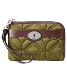 Join the quilted crowd with this vintage-inspired design from Fossil that goes from a wristlet to a wallet in just one click. The precisely organized interior is aligned with plenty of compartments--perfect for stashing cards, cash, coins and ID. Join the quilted crowd with this vintage-inspired design from Fossil that goes from a wristlet to a wallet in just one click. The precisely organized interior is aligned with plenty of compartments--perfect for stashing cards, cash, coins and ID.