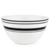 Bold black and white stripes create a crisp, graphic pattern that lends your tabletop a touch of modern sophistication.