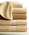 Get the spa treatment with this Desert Spa hand towel from Lauren by Ralph Lauren, featuring a textured stripe design in a warm tan colorway. Finished with dobby details along each end.