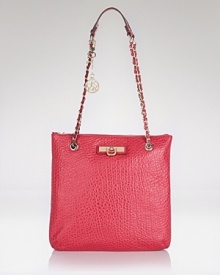 High shine hardware gives this simple and sleek convertible bag from DKNY a hit of cool. Style it over the shoulder or carry it across the body to tap this bag's versatile appeal.
