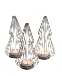 Enjoy a little change of scenery. Stainless steel wire-frame trees with votive candles liven up the living room, bedroom or even the Christmas table. From Design Ideas. Enjoy a little change of scenery. Stainless steel wire-frame trees with votive candles liven up the living room, bedroom or even the Christmas table. From Design Ideas.