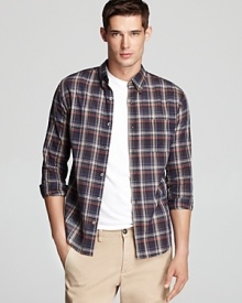 Earth tones give this plaid button-down a natural, easy-going vibe that matches your relaxed attitude, perfect with a pair of stylish jeans for a casual cool look.