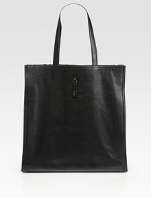 Crafted from sleek Taurillon leather, this slim carryall features a leopard-print lining for an exotic touch.Double top handles, 8½ dropOne inside zip pocketTwo inside open pocketsLeopard-print lining14W X 14H X 8DMade in Italy