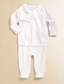 Adorable kimono-style top and pants in soft cotton jersey.V-neck with hidden snapLong sleeves with fold-over detailWrap-front with side tieSnaps on hemFooted bottomCottonMachine washImported Please note: Number of snaps may vary depending on size ordered. Adorable kimono-style top and pants in soft cotton jersey.V-neck with hidden snapLong sleeves with fold-over detailWrap-front with side tieSnaps on hemFooted bottomCottonMachine washImported Please note: Number of snaps may vary depending on size ordered.