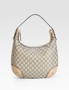 A practical silhouette with an easy carefree feel, this hobo has subtle equestrian inspired detailing and a take-me-anywhere demeanor. A practical silhouette with an easy carefree feel, this hobo has subtle equestrian inspired detailing and a take-me-anywhere demeanor.