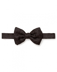 Add verve to your formal attire with a spruced-up bow tie from Salvatore Ferragamo, rendered in soft Italian silk for the look and feel of luxury.