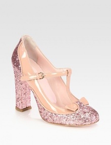 For extra va-va-voom, try this glittery patent leather pump with a feminine t-strap and bow. Glitter-covered heel, 4 (100mm)Glitter-coated fabric and patent leather upperAdjustable t-strapLeather lining and solePadded insoleMade in Italy