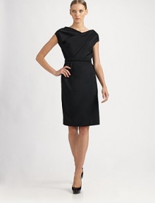 Chic and feminine, featuring an alluring twist-front neckline and a slim, detachable self belt.Jewel neckline with twist detailCap sleevesDetachable snap-close self beltAbout 24½ from natural waistCottonDry cleanMade in Italy of imported fabricModel shown is 5'10 (177cm) wearing US size 4. 