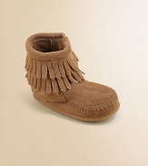 This ultra-comfortable, ultra-stylish boot is made in plush suede with a convenient side zip and layers of fringe for peace, love and fashion for your little one.Zip-upSuede upperRubber solePadded insoleImported