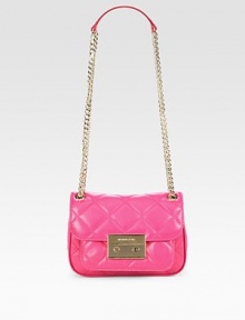 A versatile chain strap tops off this chic flap-top design made of sumptuous quilted lambskin leather. Adjustable chain and leather shoulder strap, 13½-25½ dropPush-lock on front flapLock closure on front flapOne outside open pocket under flapOne inner zip compartmentOne inside zip pocketOne inside open pocket6 credit card slotsLogo-printed lining7¾W X 5½H X 2¾DImported