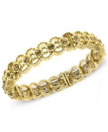 A lovely Victorian-inspired design by 2028. This stretch bracelet features shimmering glass crystal accents in an intricate setting. Crafted in gold tone mixed metal. Stretches to fit wrist. Approximate length: 7 inches. A lovely Victorian-inspired design by 2028. This stretch bracelet features shimmering glass crystal accents in an intricate setting. Crafted in gold tone mixed metal. Stretches to fit wrist. Approximate length: 7 inches.
