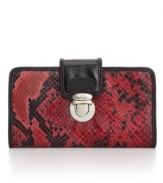 Vibrant red embossed python embellishes this chic wallet from Style&co. and the pushlock gives it a trendy snap.