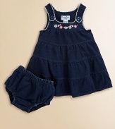 The look of denim in soft, stretch French terry with delicate scalloped trim and sweet embroidered flowers.U-shaped necklineButton strapsScalloped edgingFloral embroidered yokeTiered, flared bodyMatching panty with elasticized waist and leg openings96% cotton/4% spandexMachine washImported