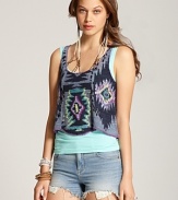 Rock the global trend in this Free People tribal print tank--lively with pops of pink and turquoise embroidery juxtaposed against earthy tones for the perfect summer look.