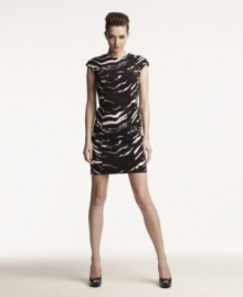 Spice up spring with this safari-chic MICHAEL Michael Kors animal-printed shift dress -- lace-up details adds a fierce factor! Spice up spring with this safari-chic MICHAEL Michael Kors animal-printed shift dress -- lace-up details adds a fierce factor!
