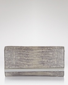This MICHAEL Michael Kors wallet fits the bill for busy days on the go, crafted of exotically-embossed leather with ample essential-organizing pockets. This MICHAEL Michael Kors wallet fits the bill for busy days on the go, crafted of exotically-embossed leather with ample essential-organizing pockets.