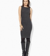A timeless knit sheath dress is finished with faux-leather trim at the neckline for a modern edge.