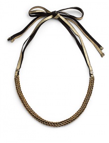 THE LOOKAntique-inspired brass chainDouble ribbon tie closure with gold foil suede detailTHE FITAbout 16 long7MM grosgrain tieTHE MATERIAL50% brass/25% leather/25% viscose rayonORIGINMade in USA THE LOOKAntique-inspired brass chainDouble ribbon tie closure with gold foil suede detailTHE FITAbout 16 long7MM grosgrain tieTHE MATERIAL50% brass/25% leather/25% viscose rayonORIGINMade in USA