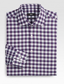A slim-fitting dress essential is given a modern update with a vibrant gingham check pattern.Button-frontSpread collarCottonMachine washImported A slim-fitting dress essential is given a modern update with a vibrant gingham check pattern.Button-frontSpread collarCottonMachine washImported