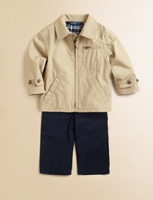 A must-have for chilly days, this classic newsboy jacket is crafted from durable cotton canvas with a soft plaid lining for a preppy look.Straight point collarLong sleeves with adjustable button cuffsFull-zip frontZip patch pocketAngled patch pockets at the hipsAdjustable hem with back button tabsFully linedCottonMachine washImported A must-have for chilly days, this classic newsboy jacket is crafted from durable cotton canvas with a soft plaid lining for a preppy look.Straight point collarLong sleeves with adjustable button cuffsFull-zip frontZip patch pocketAngled patch pockets at the hipsAdjustable hem with back button tabsFully linedCottonMachine washImported
