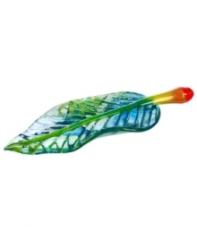 A beautiful statement piece for the dinner or coffee table, this vibrantly hued and textured leaf sculpture from Kosta Boda glistens in solid art glass. A beautiful statement piece for the dinner or coffee table, this vibrantly hued and textured leaf sculpture from Kosta Boda glistens in solid art glass.