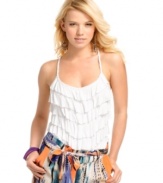 Endless tiers of ruffles plus a chic, braided neckline create perfectly summery style on this top from GUESS?.