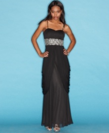 Party in grand style with this gown from B Darlin that's gorgeously jeweled and draped to perfection! Party in grand style with this gown from B Darlin that's gorgeously jeweled and draped to perfection!