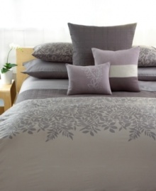 A bold and intricate pattern of leaves overlaps a checkered tonal background of printed tone-on-tone hues in this ornate Calvin Klein comforter set. Featuring 250 thread count cotton sateen in muted, modern colors, this set brings natural sophistication to your bedroom. The lavish leaf print adorns most of the comforter. A bold and intricate pattern of leaves overlaps a checkered tonal background of printed tone-on-tone hues in this ornate Calvin Klein comforter set. Featuring 250 thread count cotton sateen in muted, modern colors, this set brings natural sophistication to your bedroom. The lavish leaf print adorns most of the comforter.