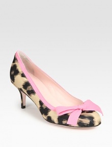 Heightened by a classic kitten heel, this leopard print pump has contrasting grosgrain ribbon trim that concludes with a bow. Self-covered heel, 2¾ (70mm)Leopard-print nylon upperLeather lining and solePadded insoleMade in Italy