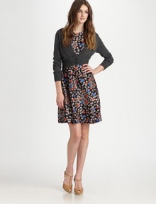 A cozy and cropped design featuring a two-button closure and ribbed details for an additional touch of texture.V-neckLong sleevesRibbed trimTwo-button frontAbout 13 from shoulder to hem79% viscose/21% polyamideHand washImported Model shown is 5'11 (180cm) wearing US size Small. 