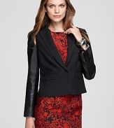 A careerist staple gets contemporary attitude as sleek leather sleeves update the Jones New York Collection blazer. Elevate the edgy style with a richly-hued sheath dress and command the corner office.