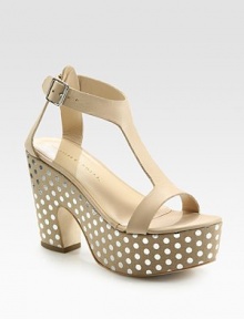 Polka-dotted leather silhouette with a sculpted heel, chunky platform and an adjustable ankle strap. Self-covered heel, 4½ (115mm)Island platform, 2 (50mm)Compares to a 2½ heel (65mm)Leather upperLeather lining and solePadded insoleImportedOUR FIT MODEL RECOMMENDS ordering true size. 
