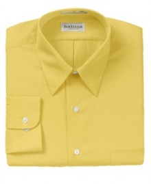 Fashioned in a convenient wrinkle free fabric, this sharp Van Heusen dress shirt will be a welcomed addition to your workweek attire.