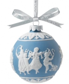 In true blue and white porcelain, this Wedgwood ornament embodies the true feeling of the season with the embossed saying: Merry Christmas and Happy New Year. In true blue and white porcelain, this Wedgwood ornament embodies the true feeling of the season with the embossed saying: Merry Christmas and Happy New Year.