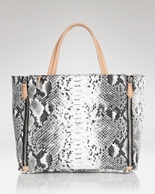 The classic canvas bag is re-rendered for the cool girl in an on-trend python print. Make a serpentine statement with this tote from Sam Edelman.