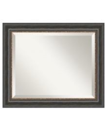 Capture the relaxed ambiance and incomparable charm of Italy's countryside with the Tuscan Rustic wall mirror. Beaded bronze trim separates the black wooden frame from beveled glass. A distressed finish commands attention in casual settings. Capture the relaxed ambiance and incomparable charm of Italy's countryside with the Tuscan Rustic wall mirror. Beaded bronze trim separates the black wooden frame from beveled glass. A distressed finish commands attention in casual settings.