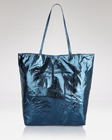 Carlos Falchi's tote is a luxe take on a classic shape. In metallic micro-fiber with an interior pouch, this style strikes an enviable balance between practicality and polish. Carlos Falchi's tote is a luxe take on a classic shape. In metallic micro-fiber with an interior pouch, this style strikes an enviable balance between practicality and polish.