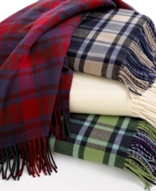 Classic comfort. Wrap yourself in the pure luxury and warmth of this throw from Pendleton, featuring plush wool fabric and your choice of either plaid or solid colors. Classic comfort. Wrap yourself in the pure luxury and warmth of this throw from Pendleton, featuring plush wool fabric and your choice of either plaid or solid colors.